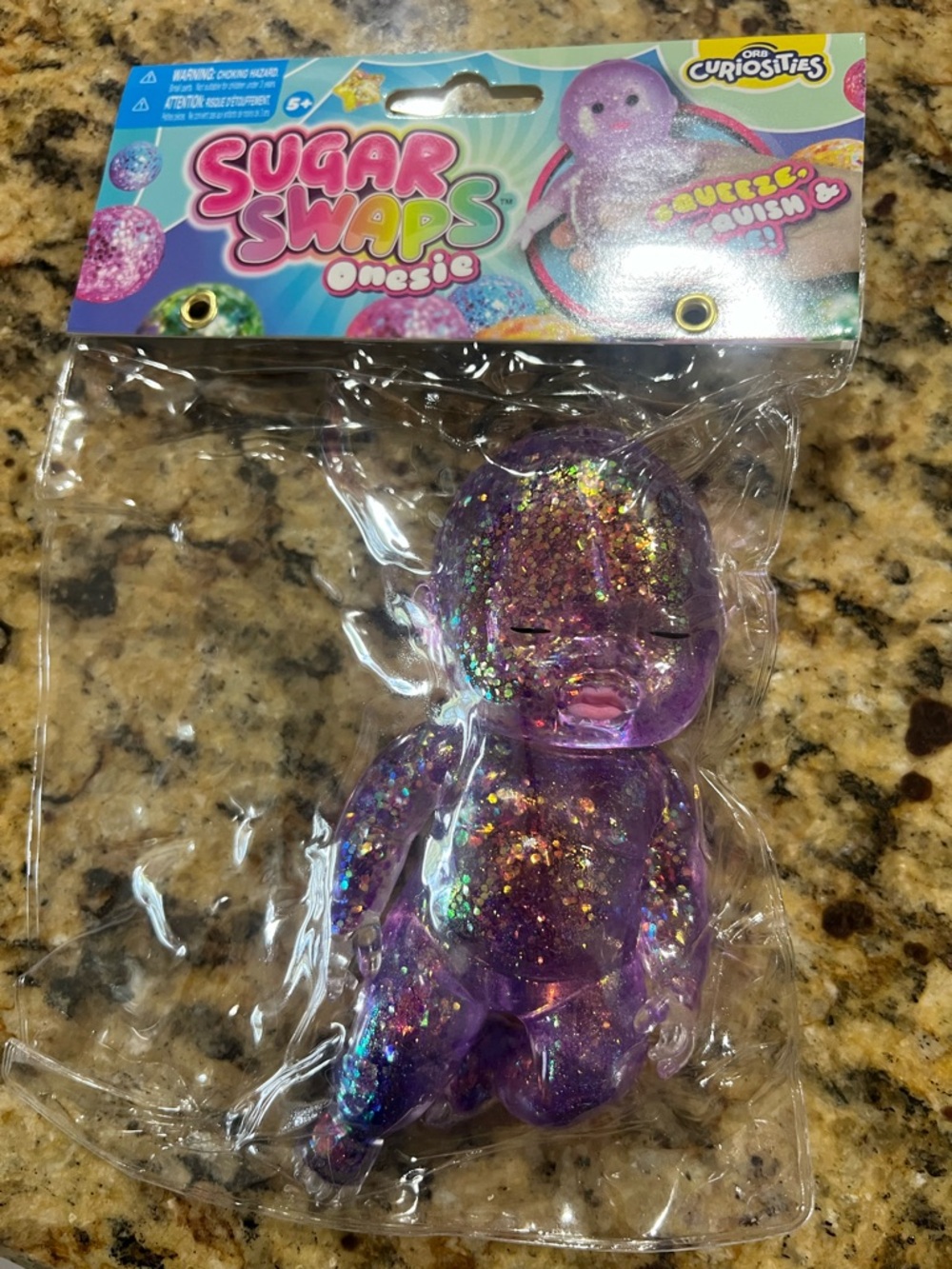 Sugar Swaps Onesie Glitter Squeeze Toy - Purple